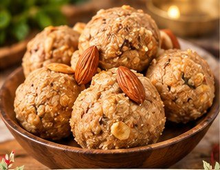 Pinni laddoos topped with almonds.